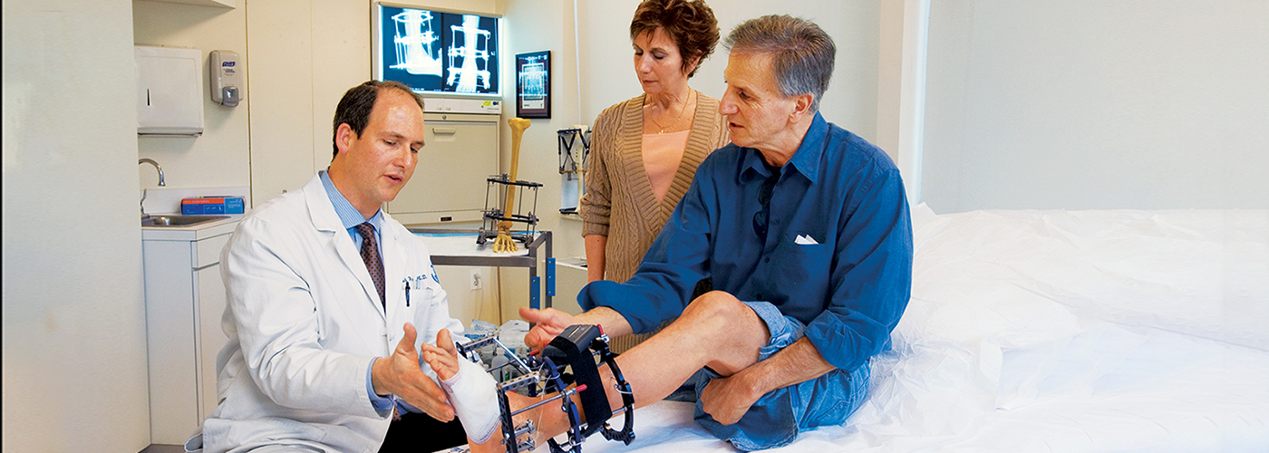 Banner image of Dr. Rozbruch with a limb lengthening patient