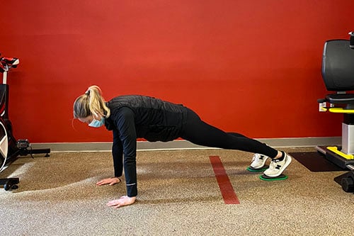 plank knee to elbow start position