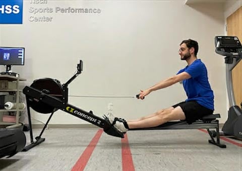 photo of aaron karp straighten legs