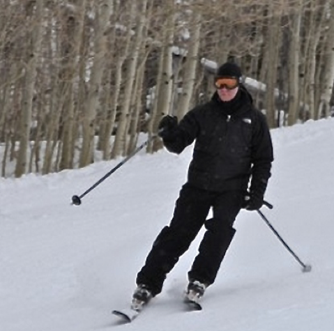 Man skiing down a hill