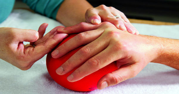 A person getting hand therapy.