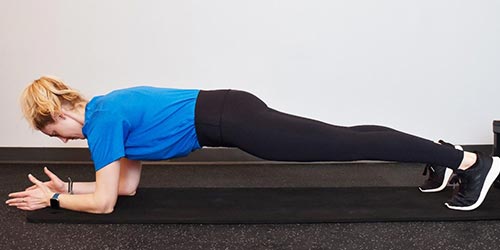 woman doing plank marches