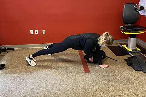 plank pull through mid position