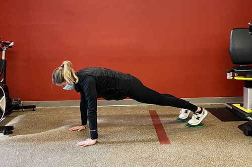 plank knee to elbow start position