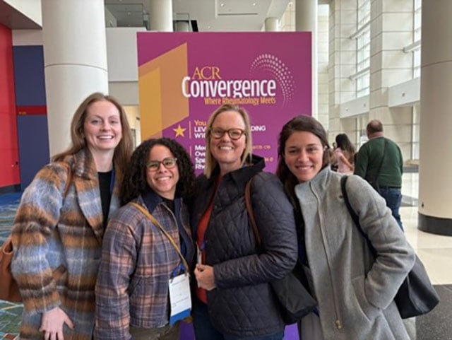 Fellows attending academic conference