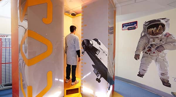 child in EOS low dose X-ray machine