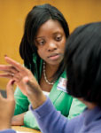 Image of two women speaking