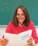 Image of a teacher smiling