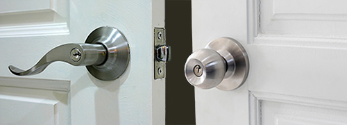 Lever arm door handle shown next to a standard round doorknob.
