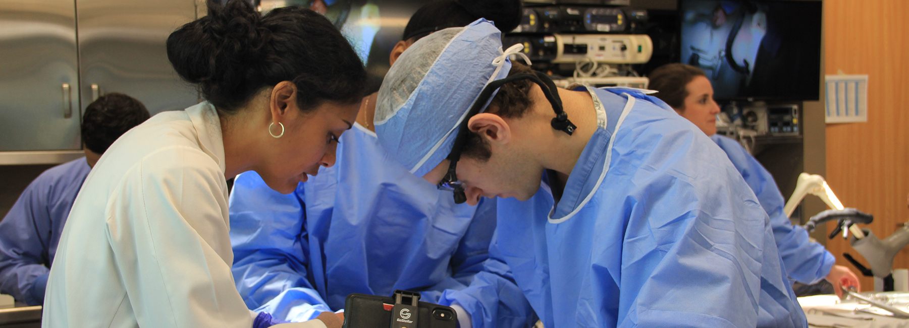 Banner image of Dr. Duretti Fufa overseeing a medical student during a procedure.