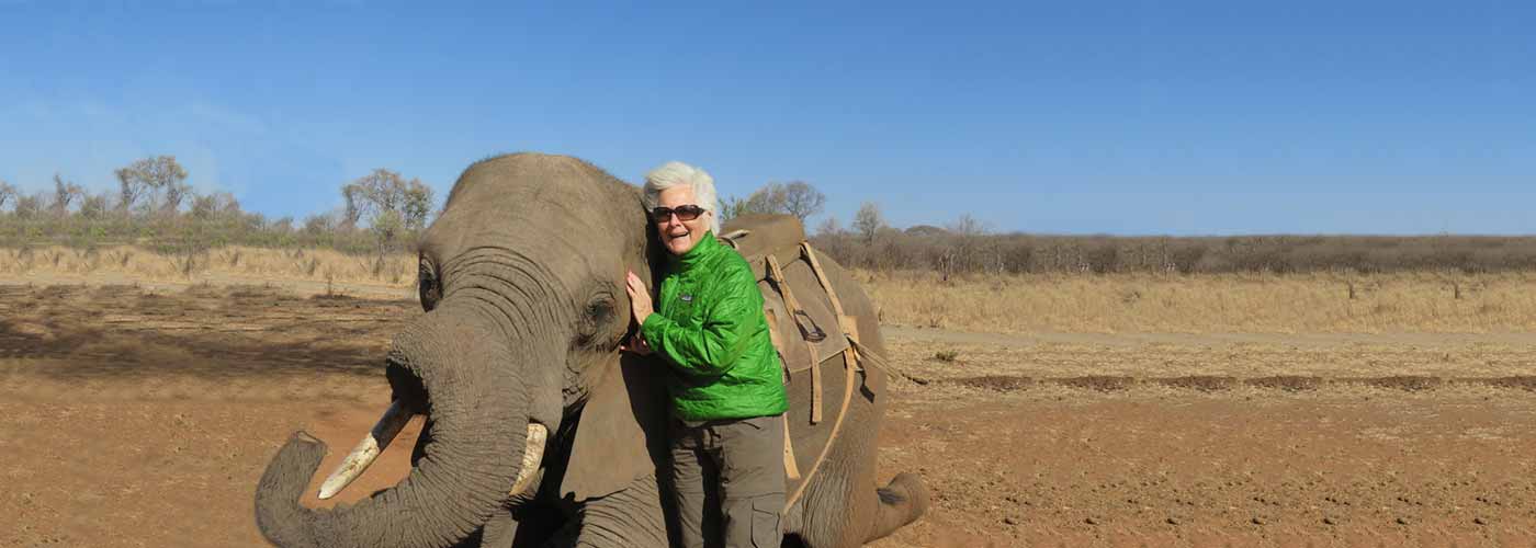 Member Taking Picture with Elephant