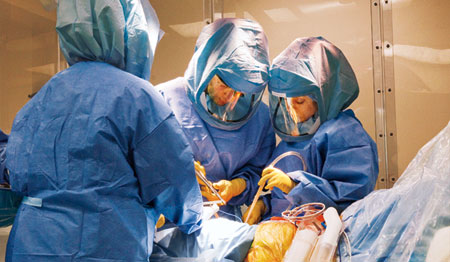 Photo of medical professionals performing surgery