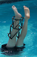 Photo of Chad's legs in the pool.