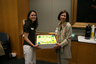 Angela Hunter and Roberta Horton from the Department of Social Work holding a cake