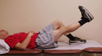 Thumbnail photo of leg raise exercise