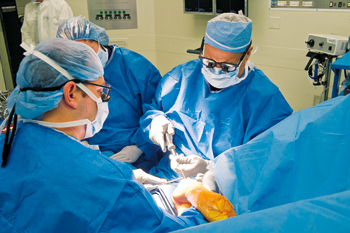 Robert Hotchkiss, MD performing surgery