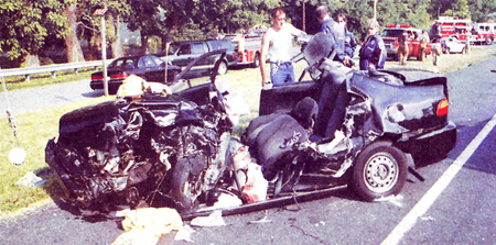 Photograph of the vehicle and scene from a car accident from a case example of distal femur fracture from the Orthopedic Trauma Service at Hospital for Special Surgery.