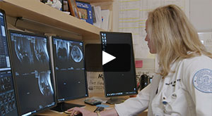 Video thumbnail image of Dr. Hollis Potter reviewing MRI scans.
