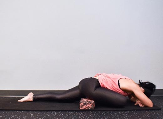 photo of cara demonstrating Pigeon with quad stretch 2 of 2