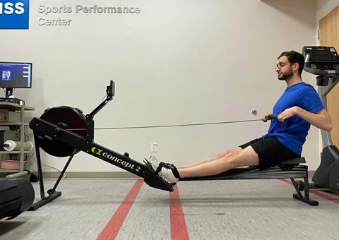 photo of aaron karp demonstrating proper rowing technique