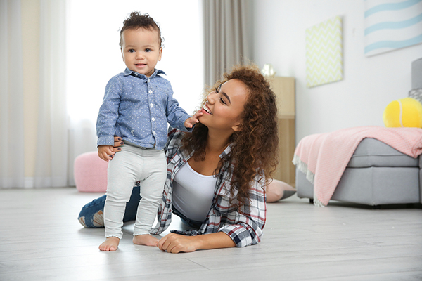 child walking with parent