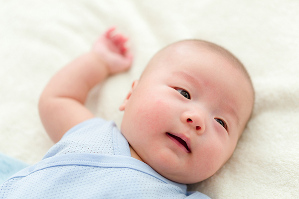 Photo of a newborn baby in a crib.