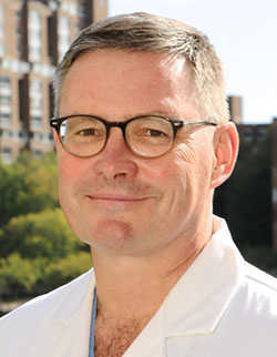 Image - headshot of John G. Muller, MD, MBA