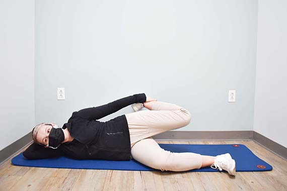 photo of a side lying hip flexor stretch