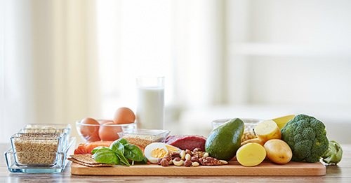 An assortment of nutritious foods on a cutting board.