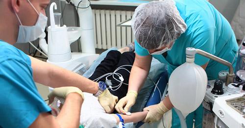 A child being prepared for anesthesia.