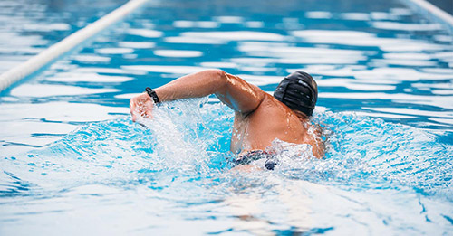 A competitive swimmer in the pool.